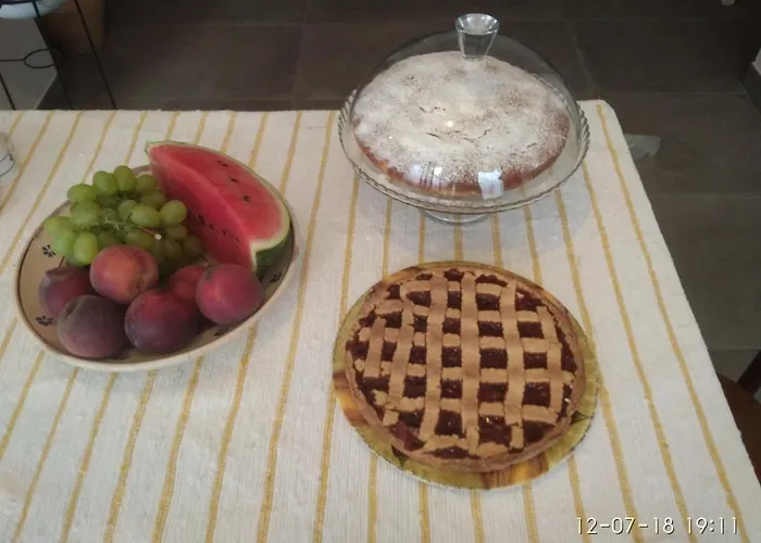 לינה וארוחת בוקר Cortile Calinea 3*